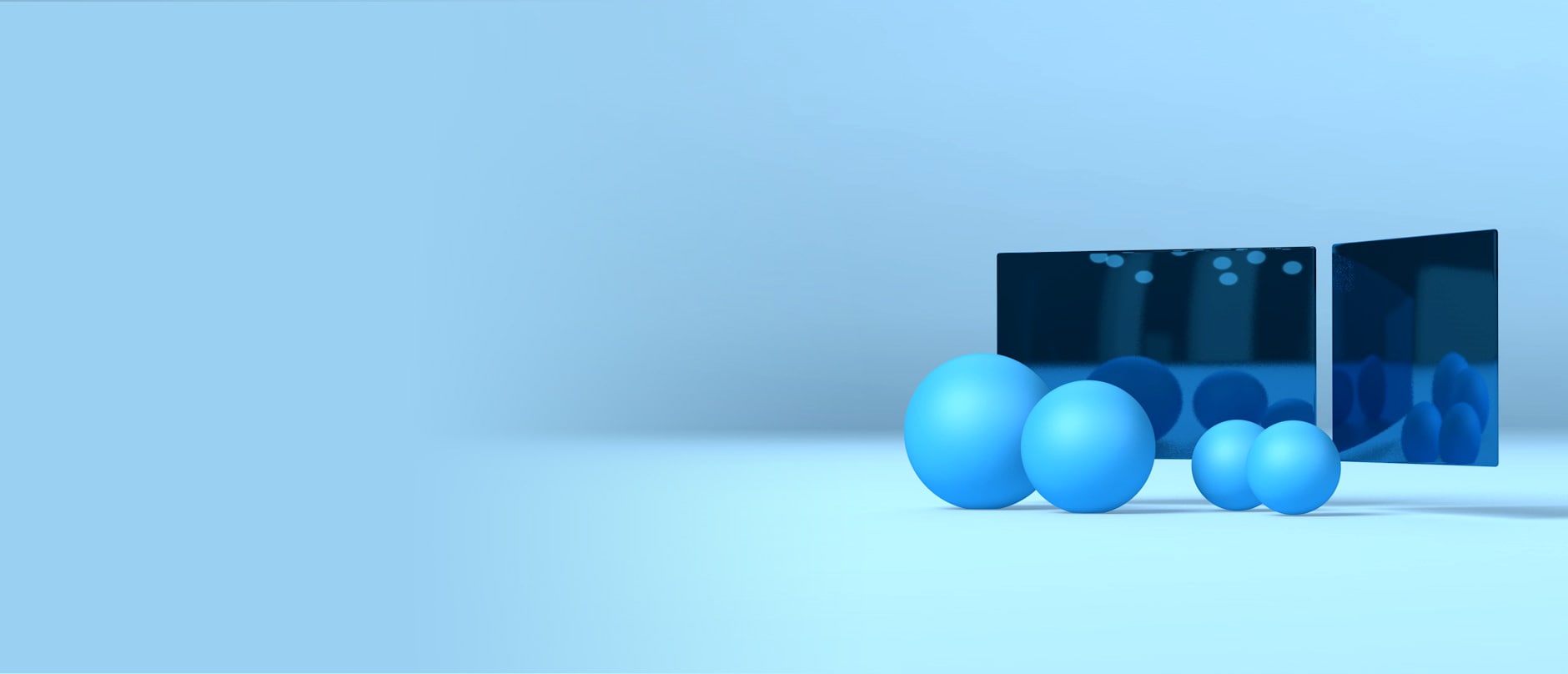 Blaue Kugeln vor 2 reflektierenden Bildschirmen auf einem Hellblauer Hintergrund